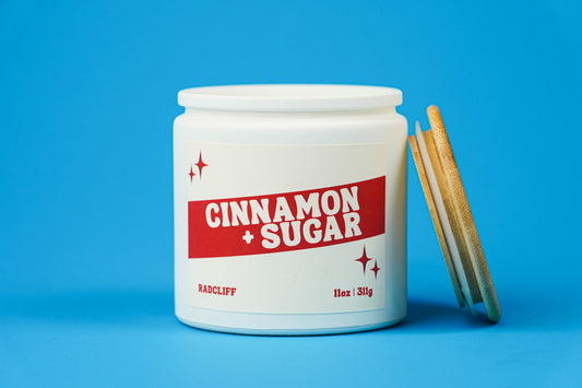 Cinnamon + Sugar Candle - 11 oz white jar, lid off