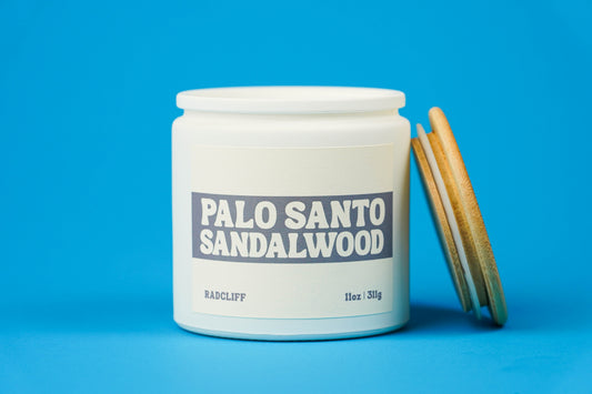Palo Santo Sandalwood Candle - 11 oz white jar, lid off