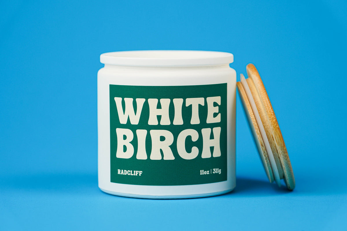 White Birch Candle - 11 oz white jar, lid off