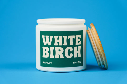 White Birch Candle - 11 oz white jar, lid off